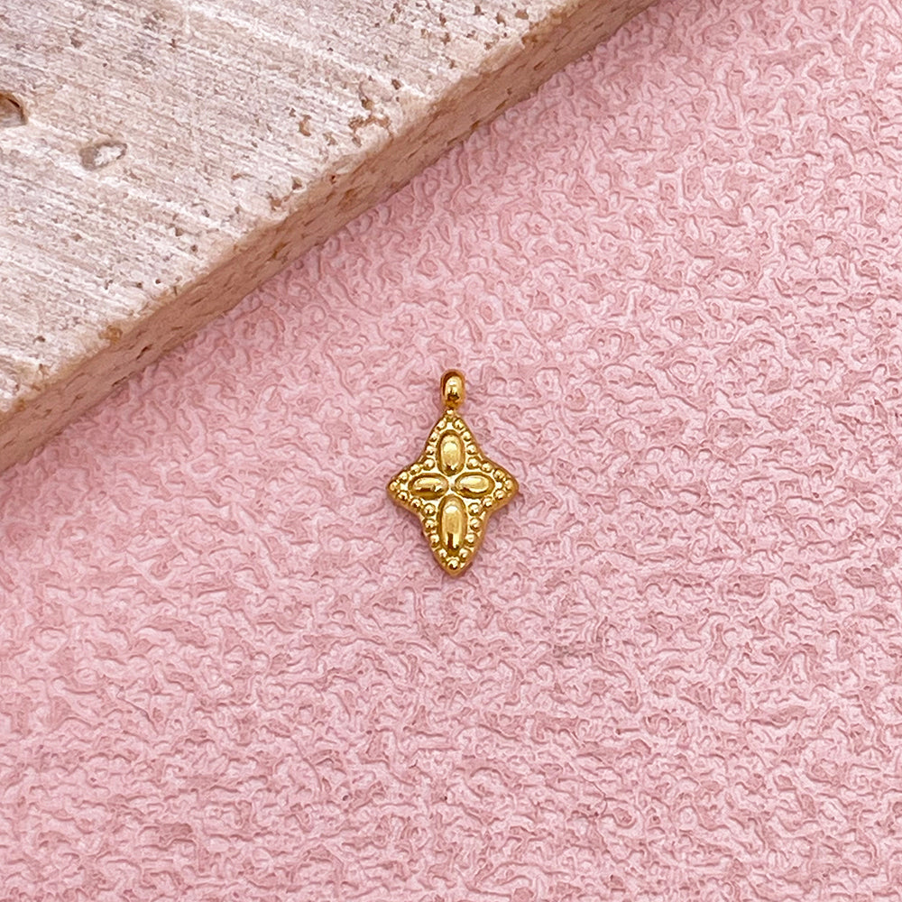 0560 Four pointed star charm