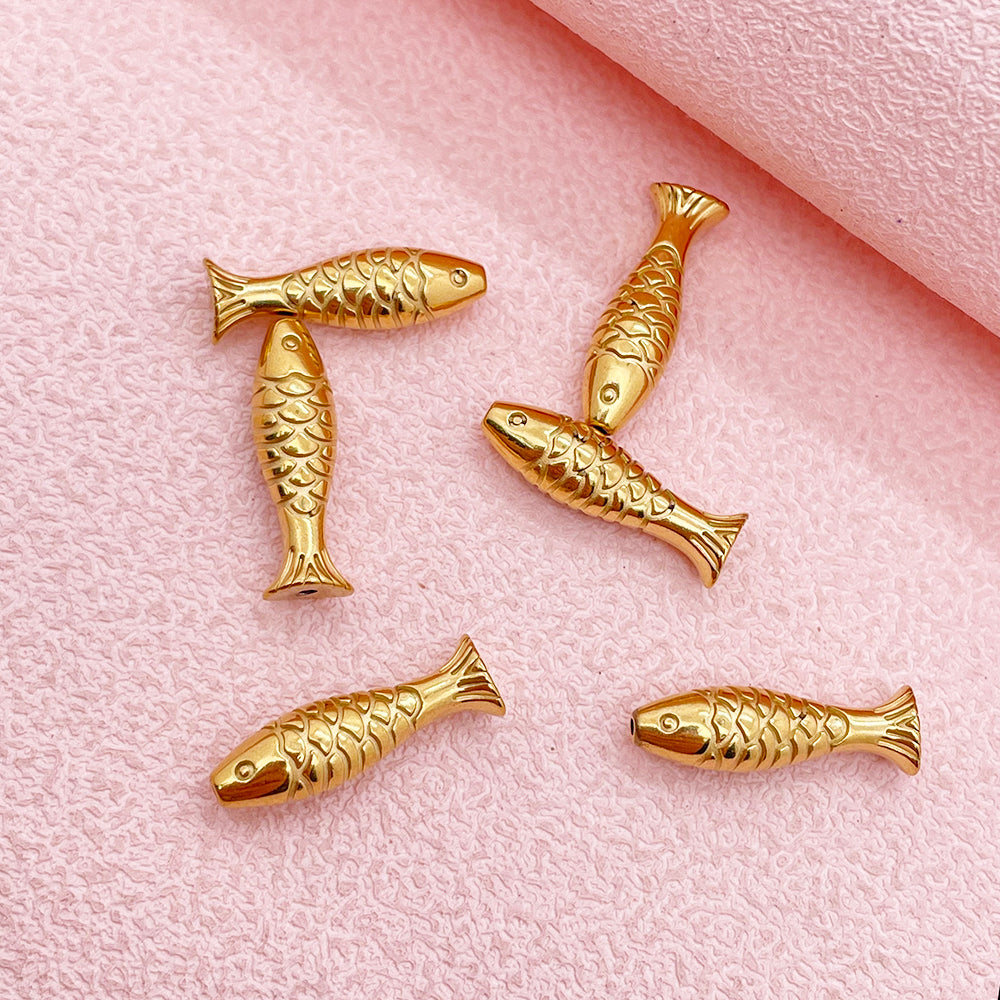 Fish hole charm
