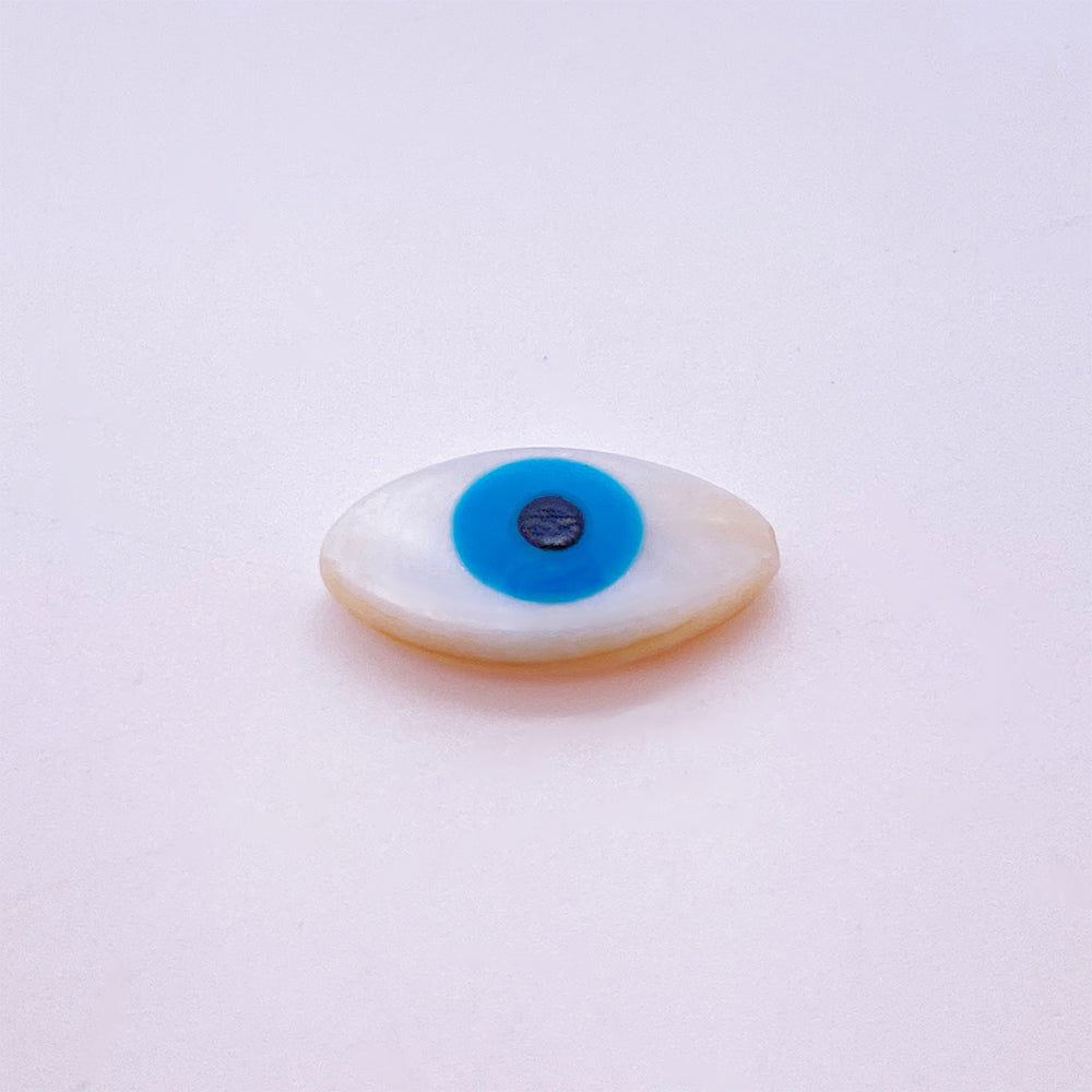 Evil eye shell charm