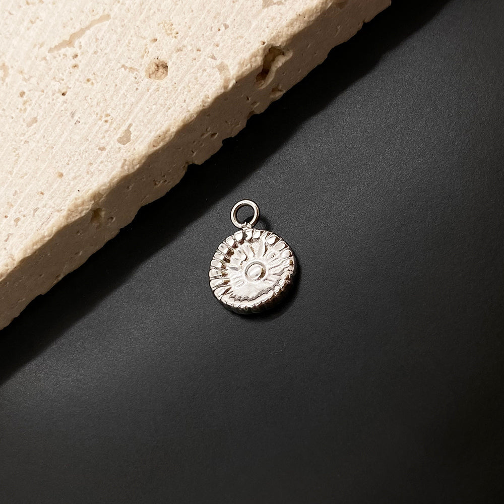 1143 Sun charm
