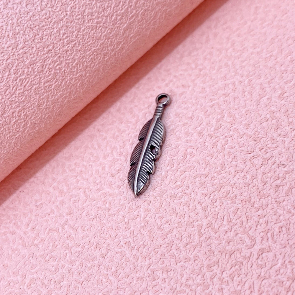 PC474 Feather charm