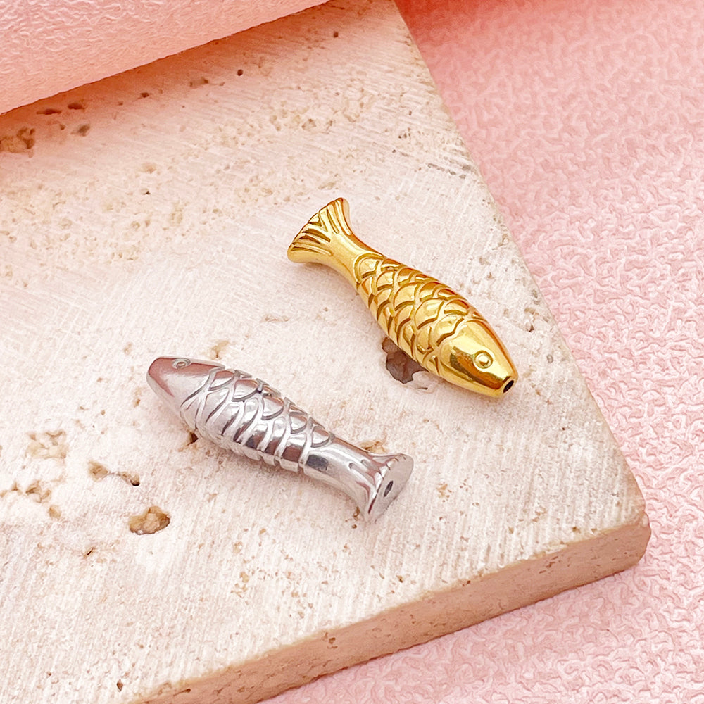 Fish hole charm