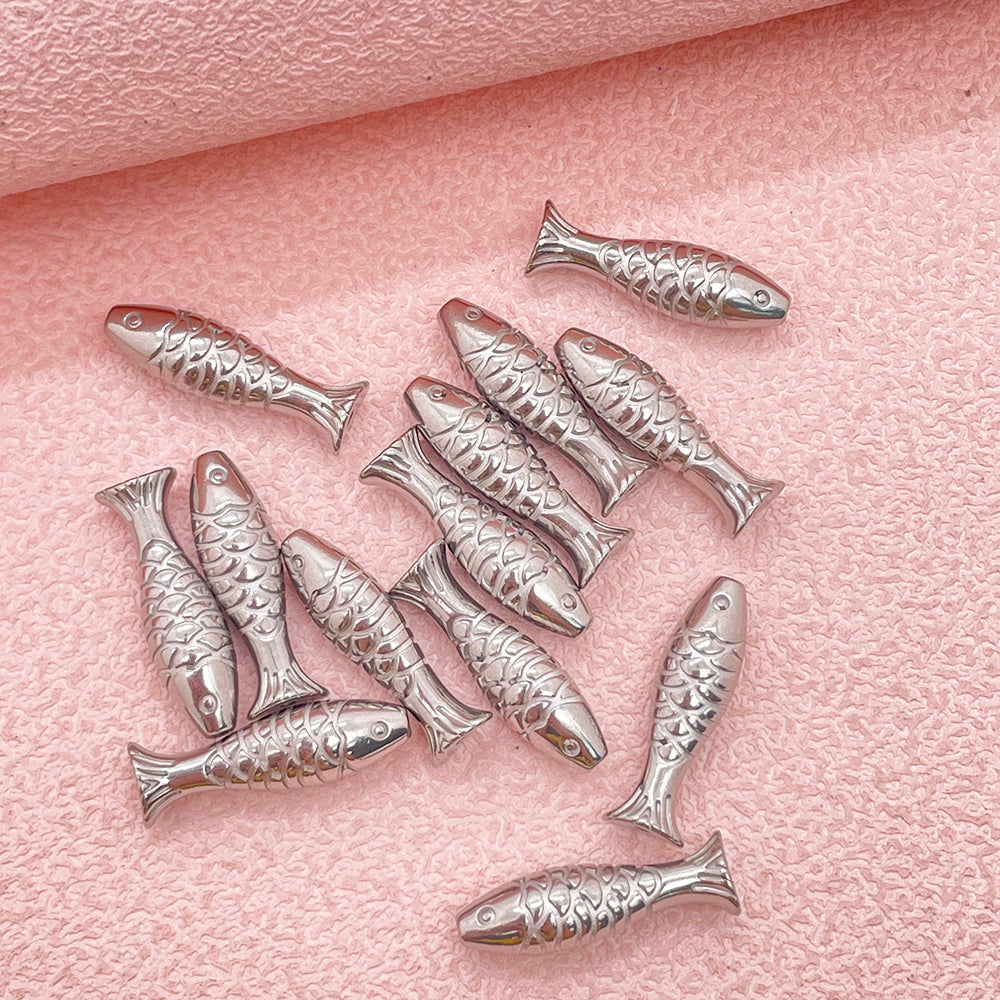 Fish hole charm