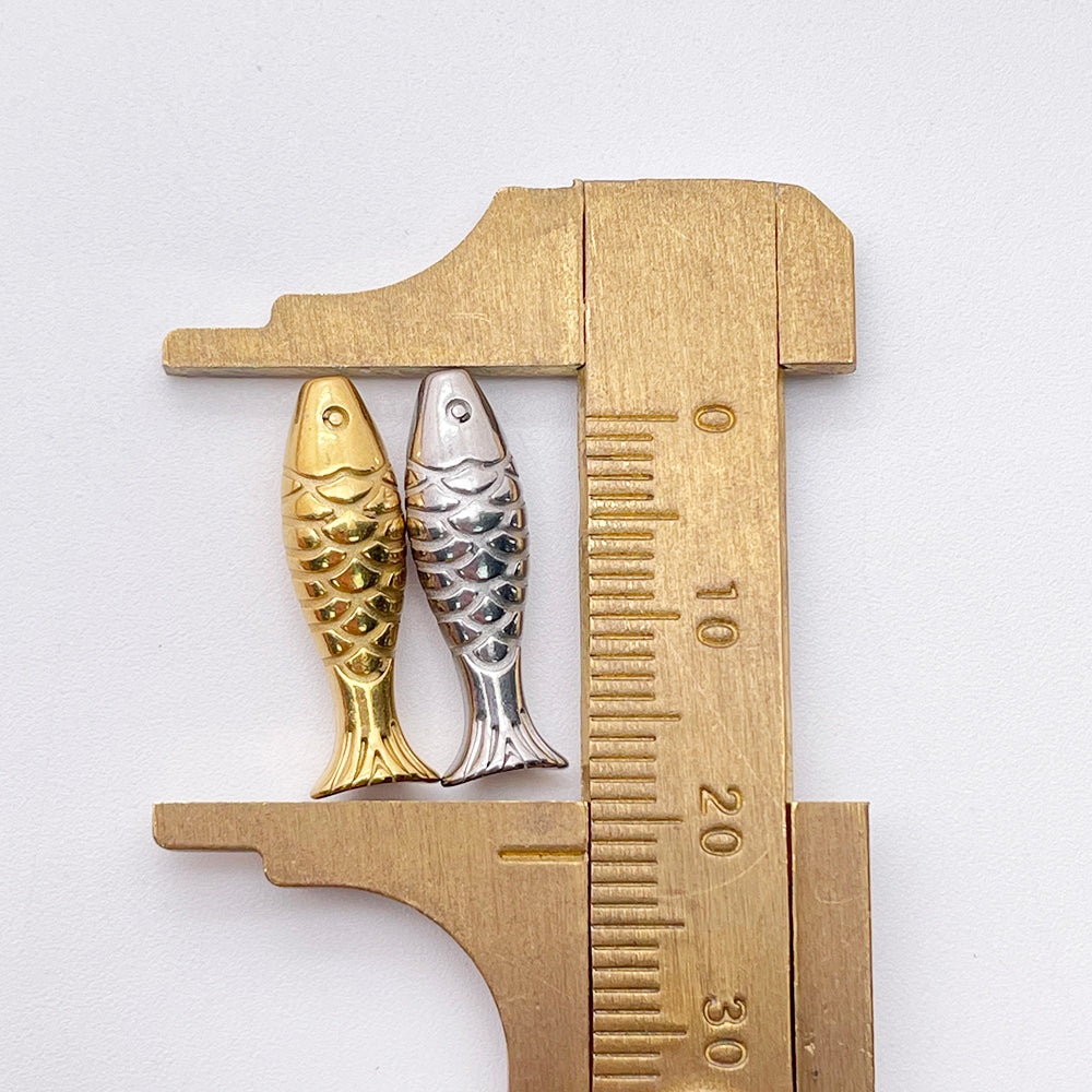 Fish hole charm